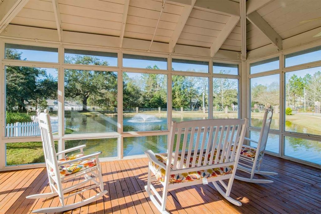 Patio overlooking the pond at Live Oak Village, a Gulf Coast retirement community in Foley, AL